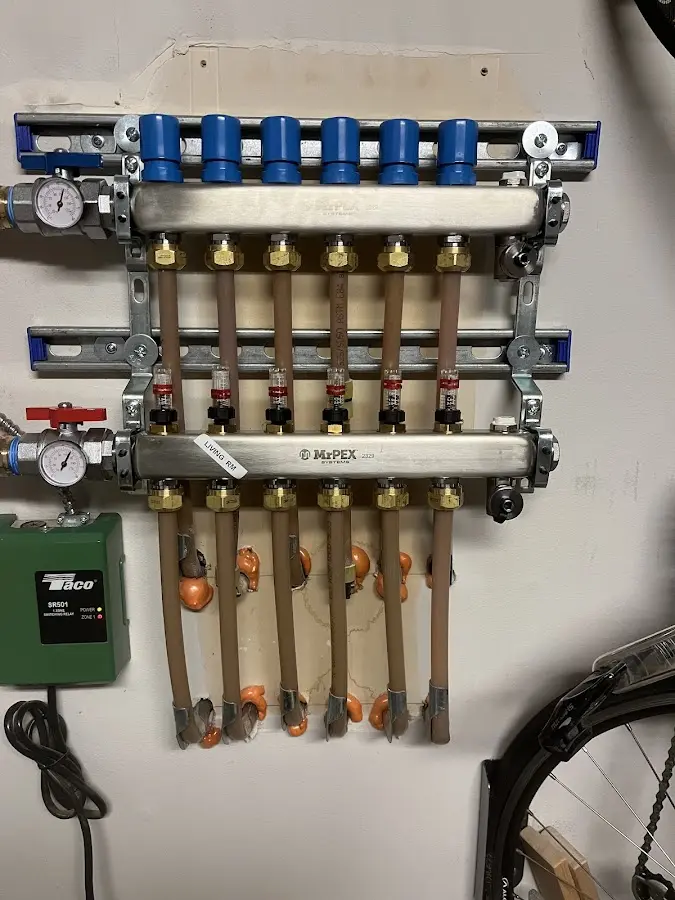 Plumber performing Gas Line Installation at a residential property in Vergennes